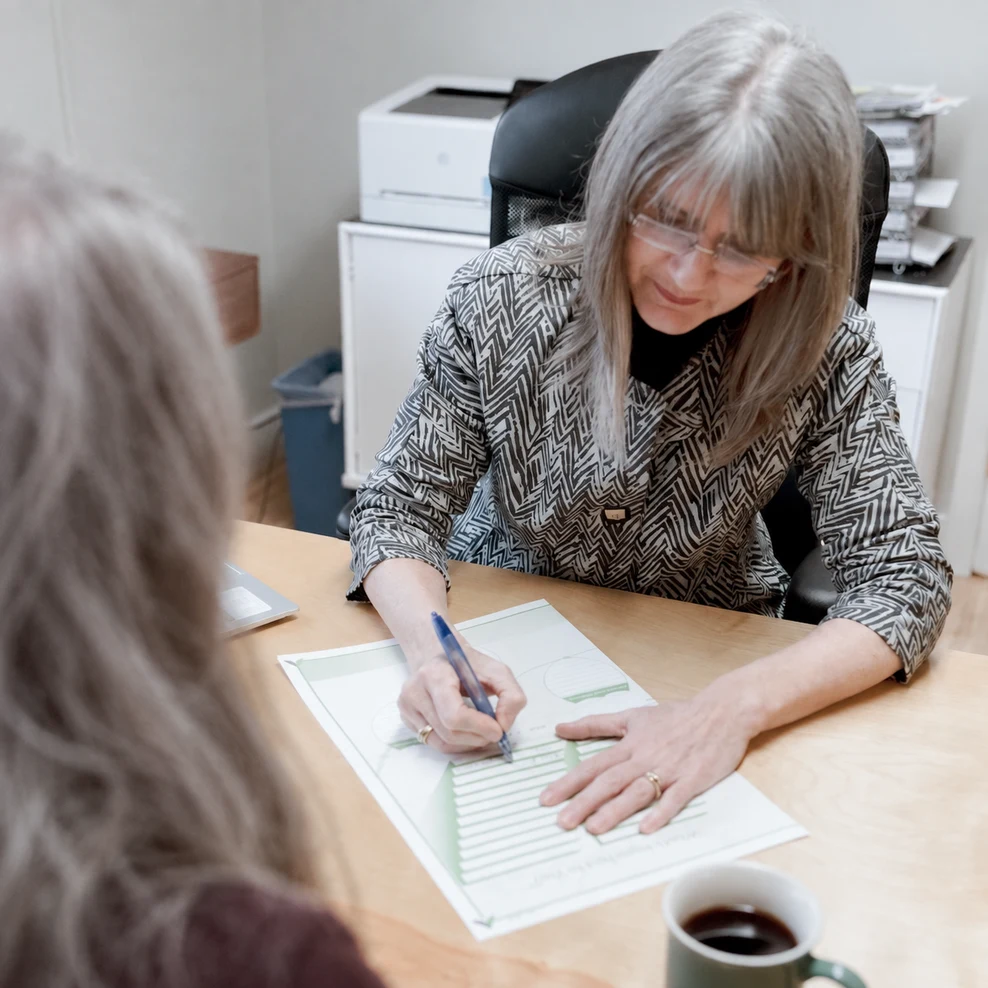 An advisor discusses retirement planning with a client